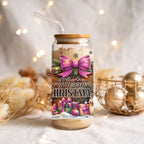 Glass jar with Christmas design and straw lid on a decorative background