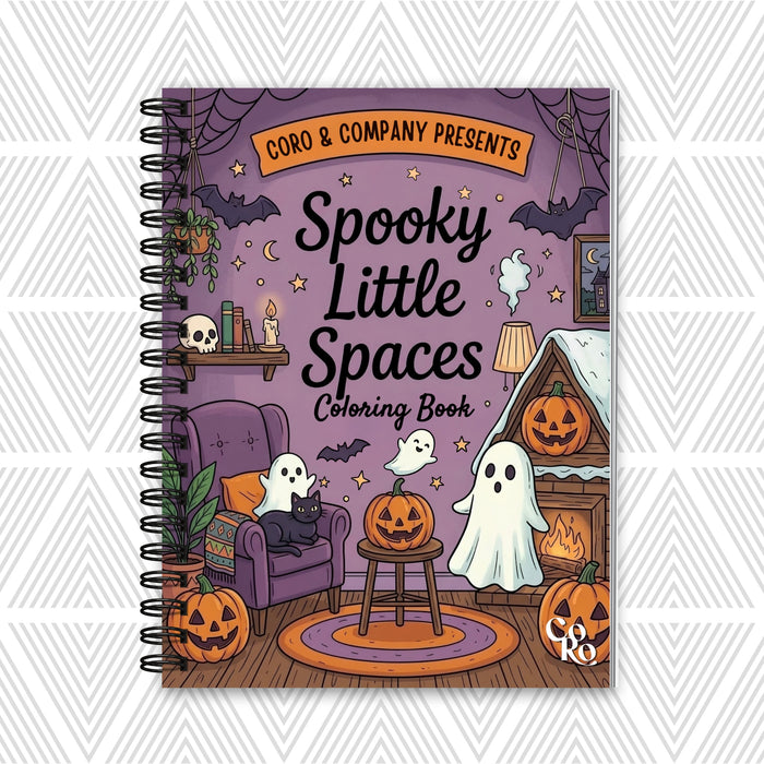 A spiral-bound coloring book titled 'Spooky Little Spaces Coloring Book' by CoRo & Company, featuring a Halloween-themed illustration with ghosts, pumpkins, a purple chair, and a fireplace on the cover, set against a light gray patterned background.