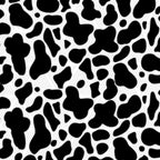 Black and white cow print pattern with irregular black spots on a white background.