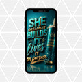 A black smartphone centered on a white geometric patterned background, displaying a motivational quote poster with teal and gold lettering and a glittery teal bottle graphic. The phone has a visible MagSafe ring, and the screen text reads, 'SHE DREAMS IT BUILDS IT lives IT on purpose' with additional text on the bottle.