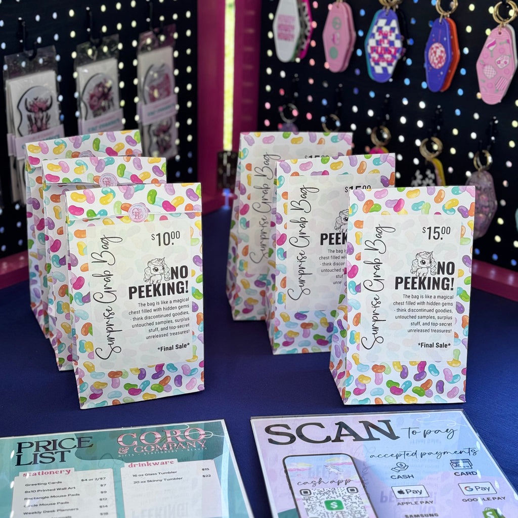 Colorful product packaging with text and price lists on a display stand.