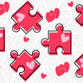 Pink puzzle pieces with hearts on a white background