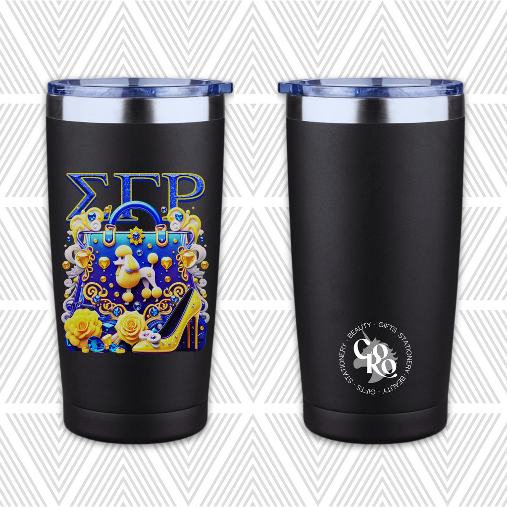 Two views of a black insulated tumbler with a clear lid on a light gray patterned background. The left tumbler shows a decorative graphic with blue Greek letters, a blue handbag, yellow roses, and a yellow high-heel.