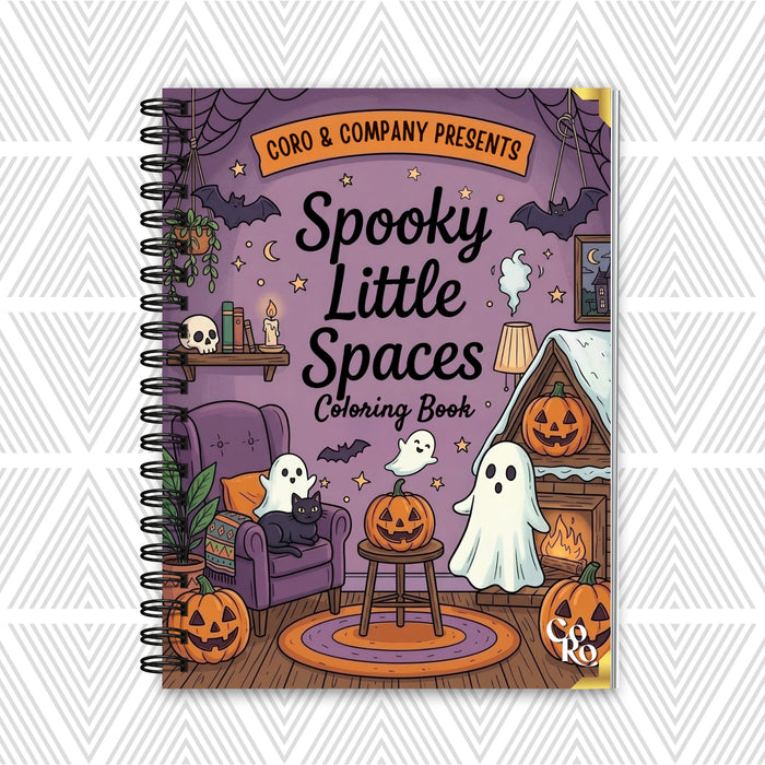 A spiral-bound coloring book titled 'Spooky Little Spaces Coloring Book' by CoRo & Company, featuring a Halloween-themed illustration with ghosts, pumpkins, a purple chair, and a fireplace on the cover, set against a light gray patterned background.