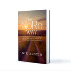 Book titled 'The CoRo Way' by Nik Austin with a sunset design on the cover.