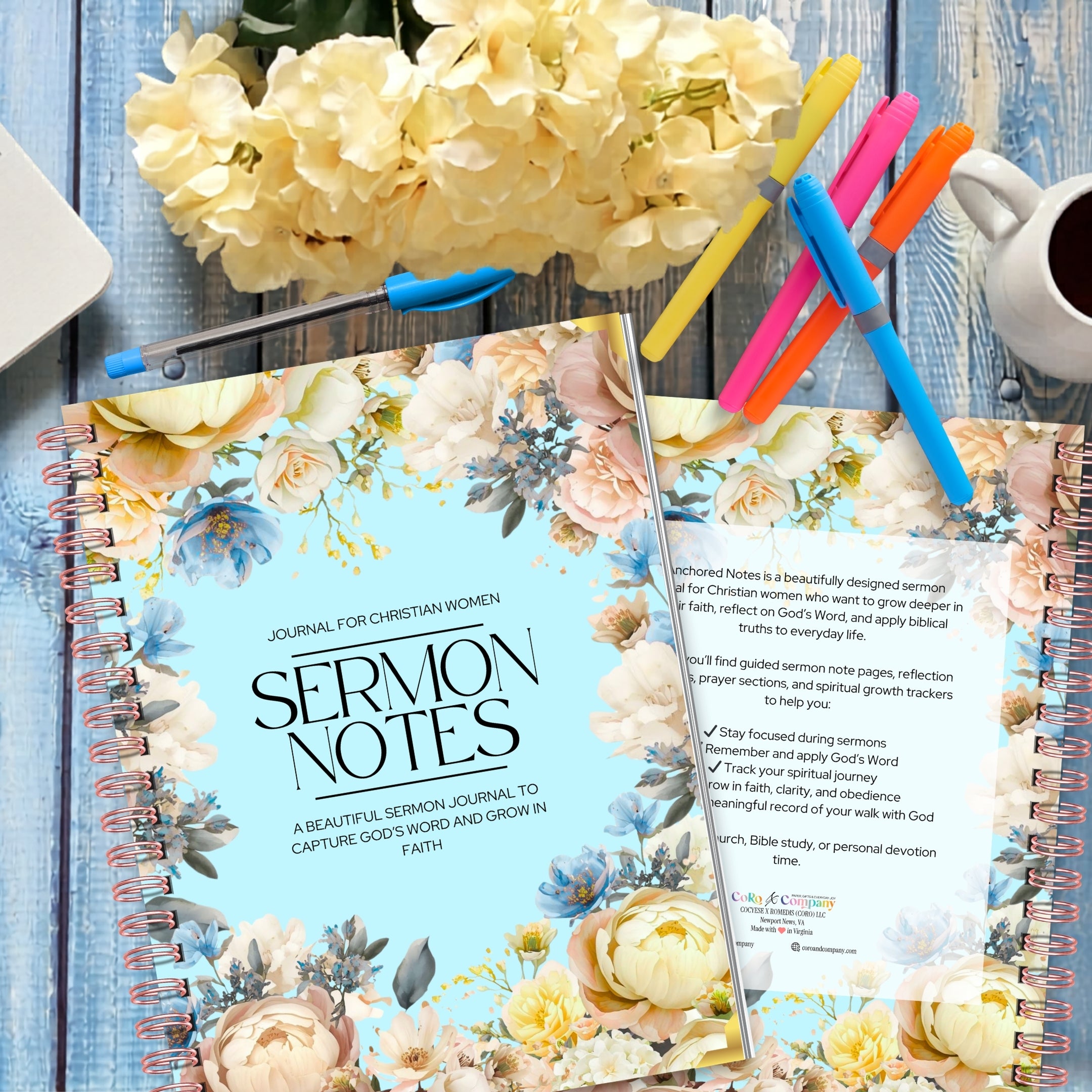 Journals titled 'Sermon Notes' with floral design on a wooden surface with flowers and pens.