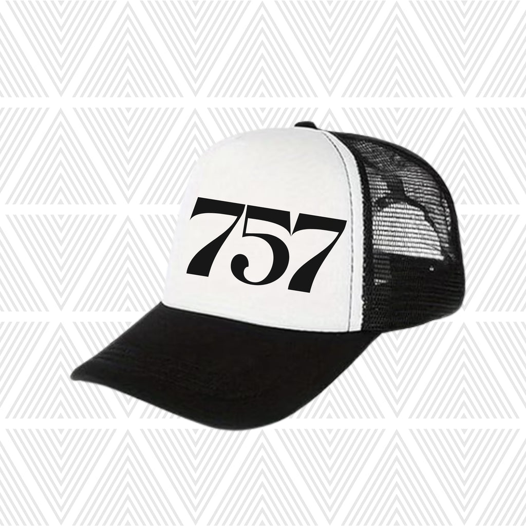 Black and white trucker hat with area code '757' logo on a geometric patterned background