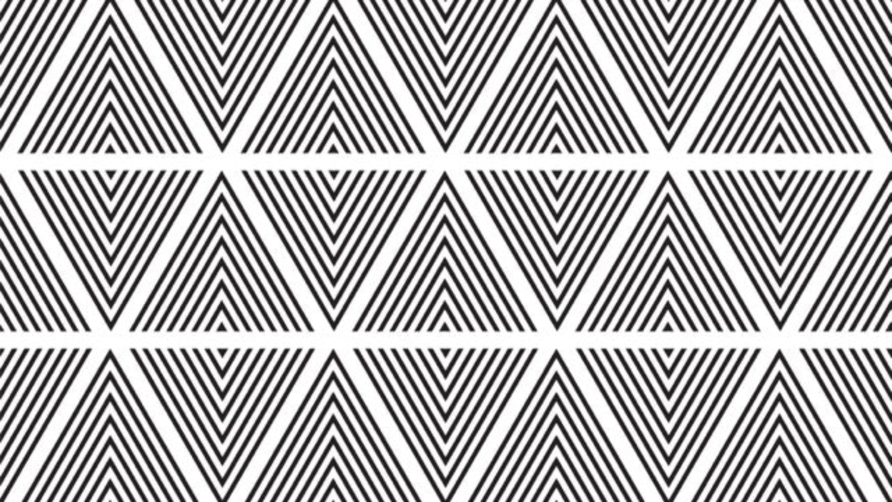 Pattern of black and white triangles on a white background