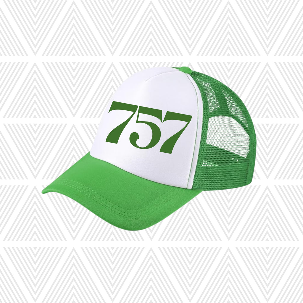 Green and white cap with '757' area code on a geometric patterned background