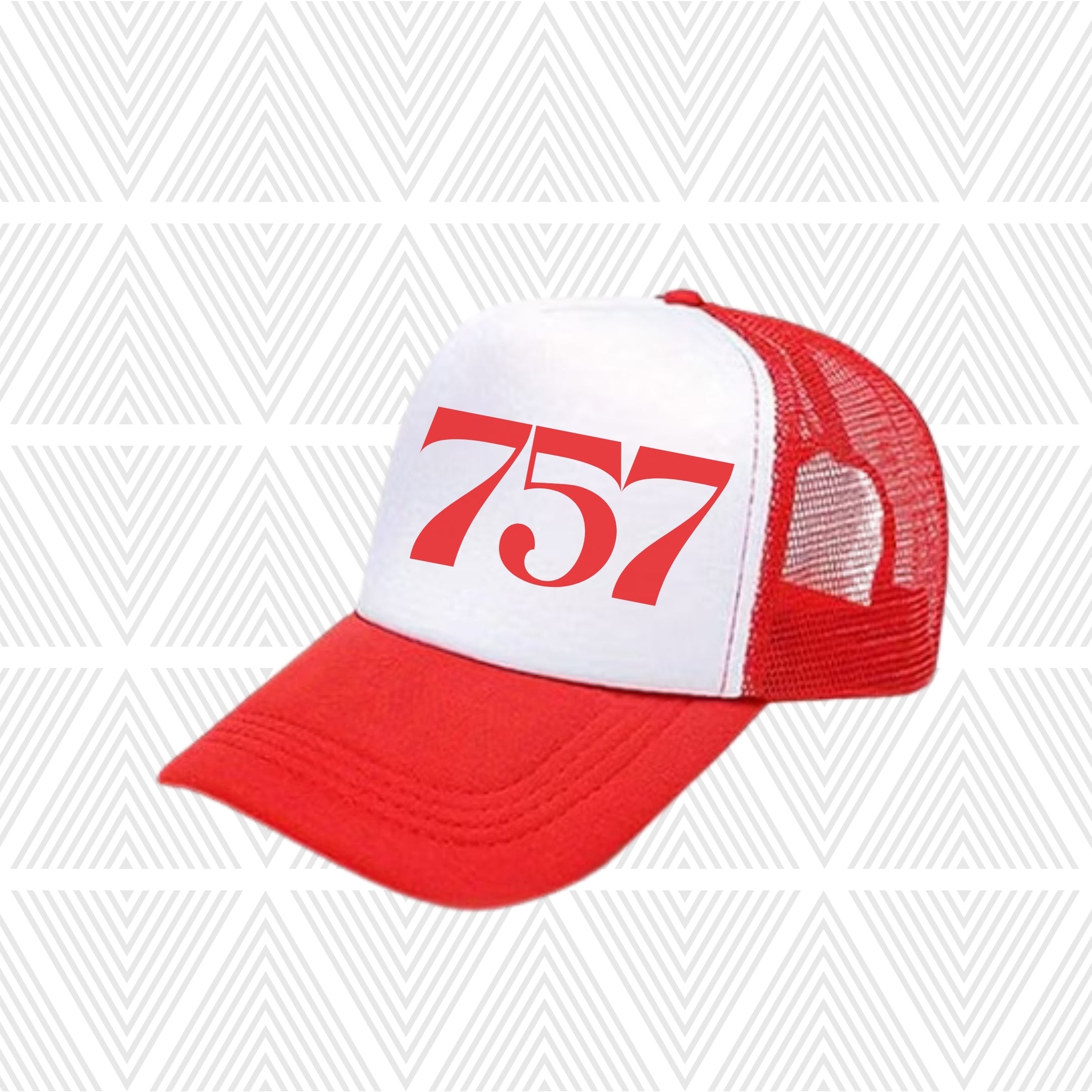 Red and white cap with area code '757' printed on a geometric patterned background