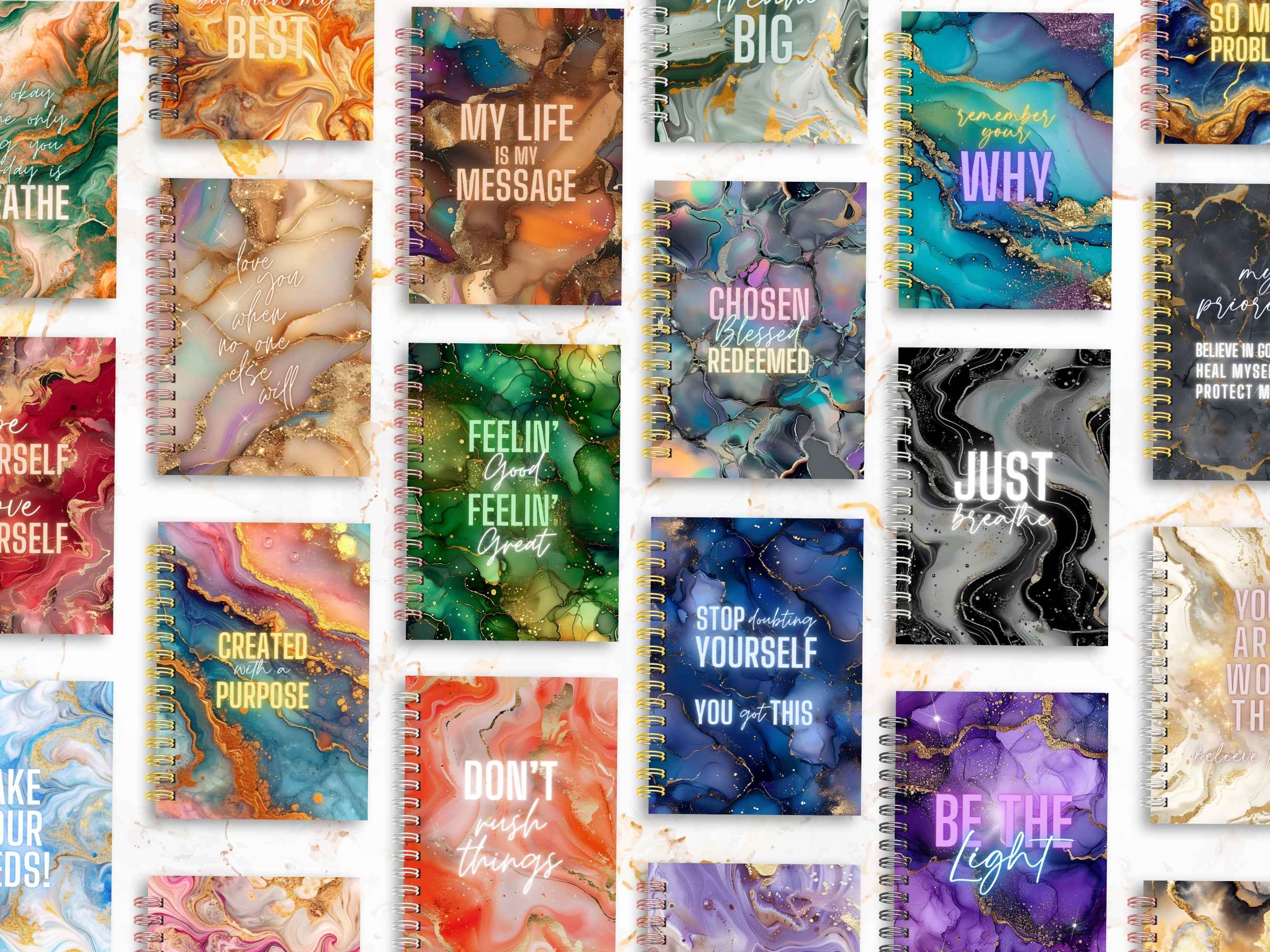 Collection of notebooks with various designs and motivational quotes on a white background